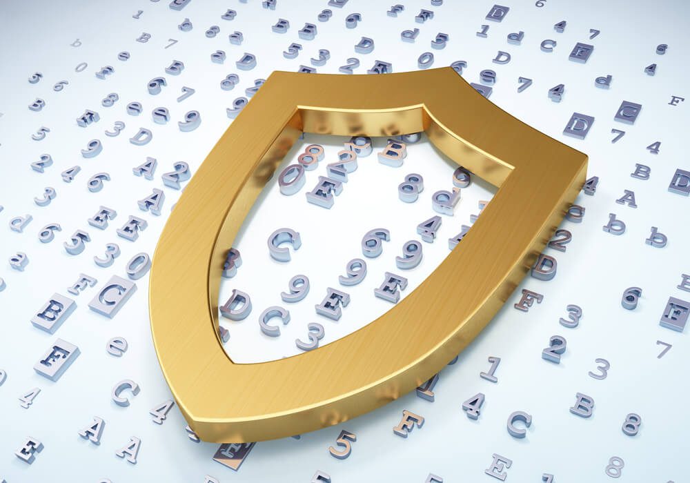 a golden shield surrounded by letters and symbols.