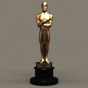 a golden statue of a man standing on a pedestal.