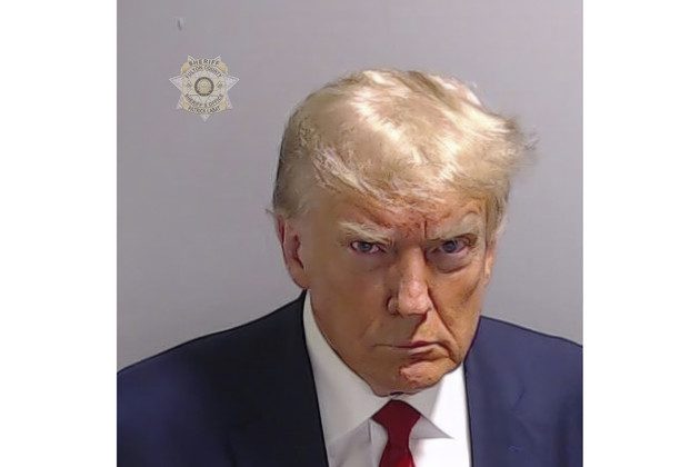 Donald trump in a mugshot.