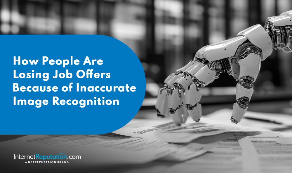 A robotic hand hovers over job application papers, with a blue text box stating, "How People Are Losing Job Offers Because of Inaccurate Image Recognition Technology." The InternetReputation.com logo appears at the bottom.