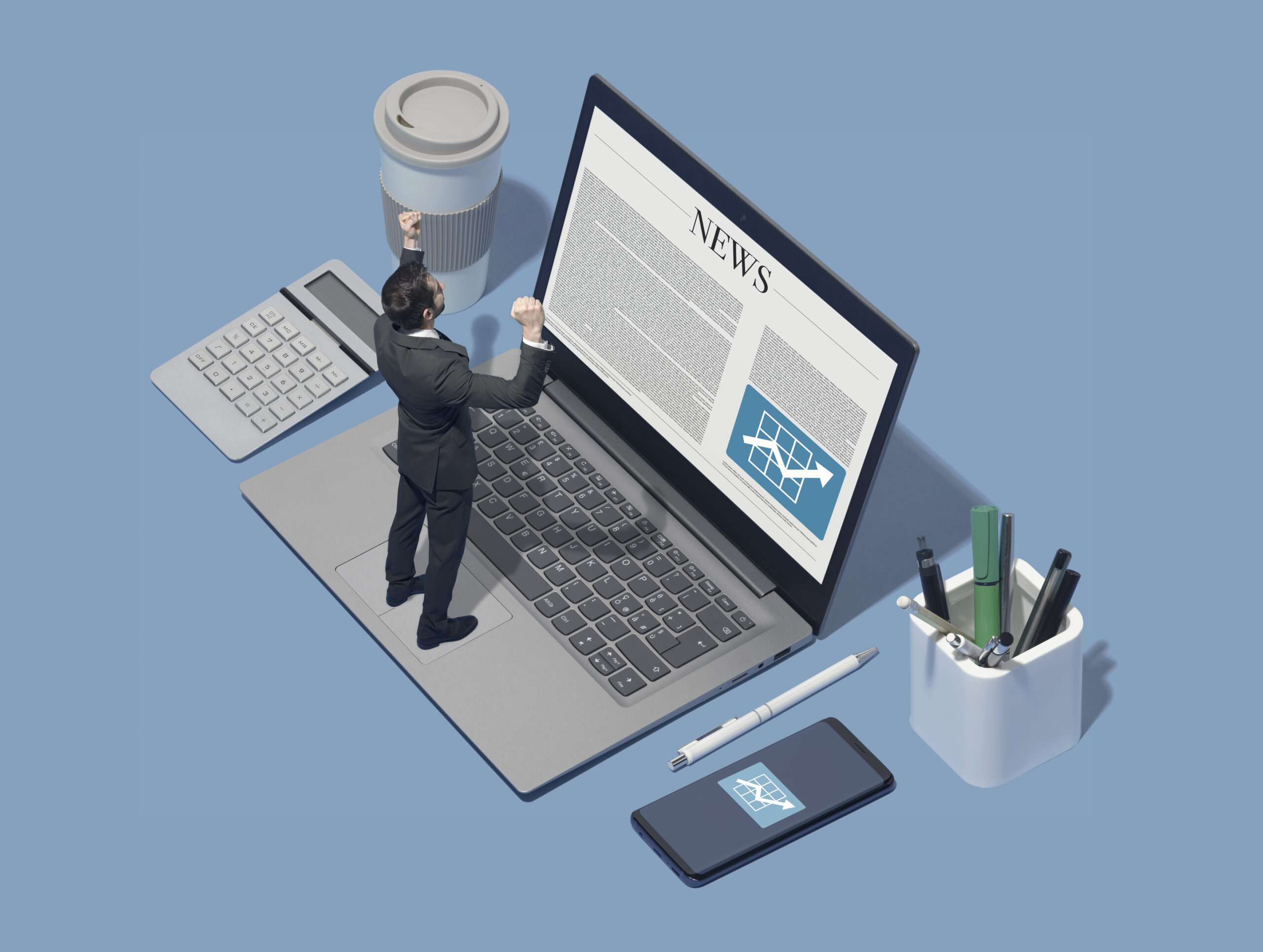 A miniature businessman stands on a laptop keyboard, appearing to interact with a digital newspaper on the screen. Surrounding items include a coffee cup, calculator, pen, smartphone, and a holder with pens and scissors.