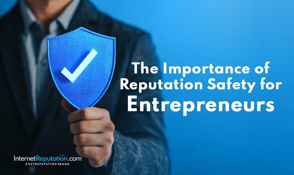A person in a suit holds a blue shield with a checkmark, symbolizing Reputation Safety. Text reads, "The Importance of Reputation Safety for Entrepreneurs." The blue background features the InternetReputation.com logo at the bottom left.